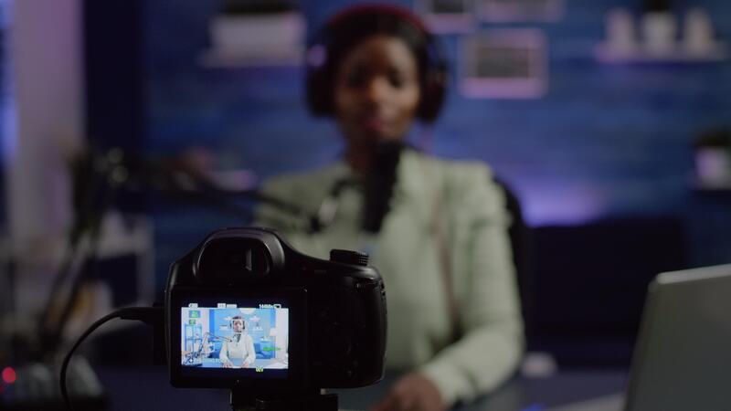 African content creator filming video for social media platforms