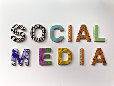 Colorful social media letters and symbols representing diverse social media marketing campaign design
