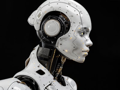 Futuristic humanoid robot head in profile representing advanced AI chatbot and machine learning technology
