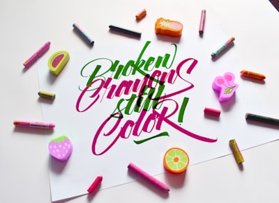 Colorful broken crayons with text demonstrating creative branding and design philosophy for artistic brand identity