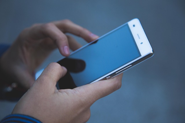People using mobile phones in Bahrain