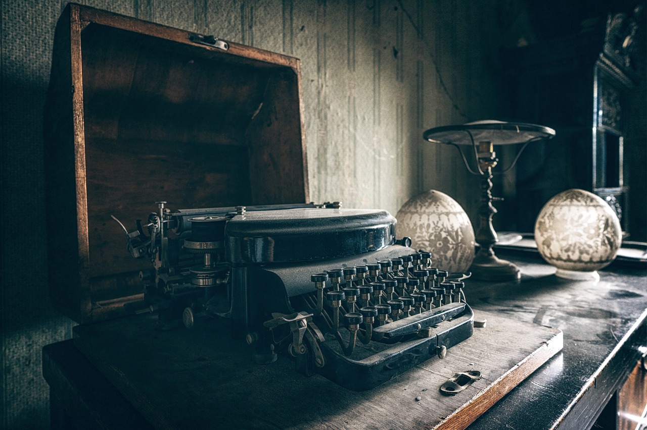 Antique typewriter on wooden desk